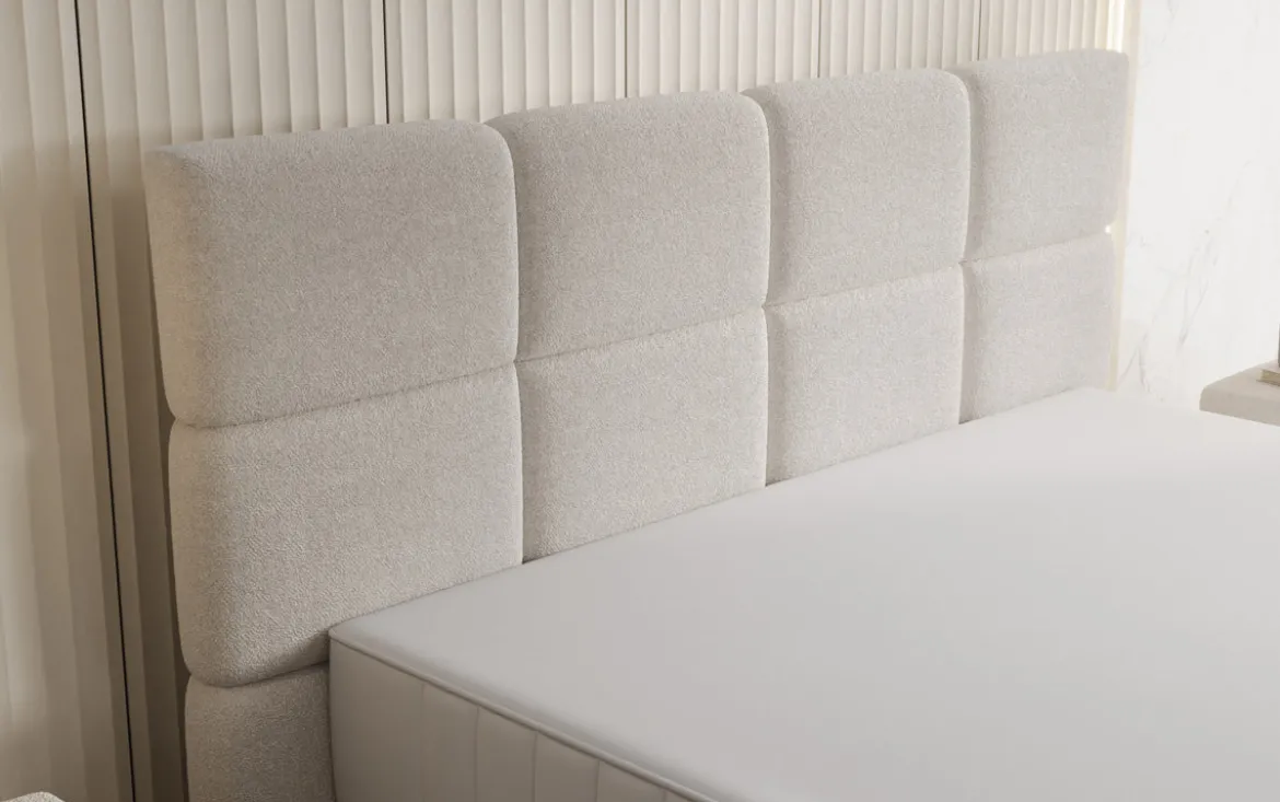 Boxspringbett Nessa mit hohen Füßen in Teddy Bouclé
