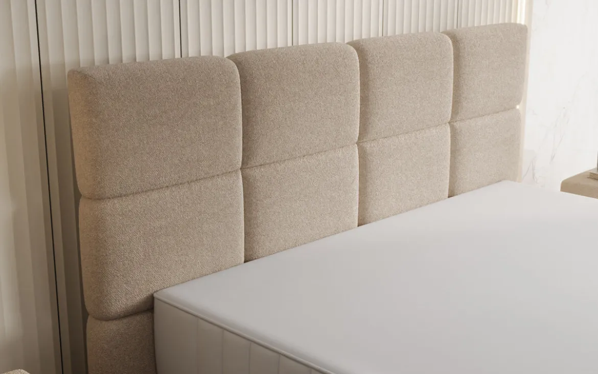 Boxspringbett Nessa mit hohen Füßen in Teddy Bouclé