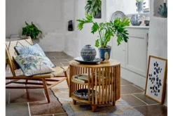 Couchtisch Keegan – Rundes Mangoholz-Design mit praktischen Ablagen