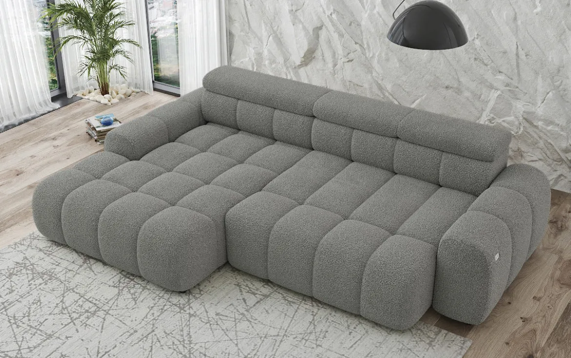 Designer Ecksofa Elaro mit elektrischer Sitzerweiterung in Bouclé