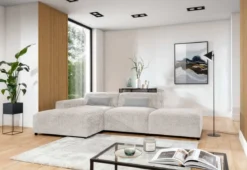 Designer Ecksofa Napoli inkl. Beistellhocker