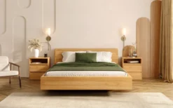 Designer Holzbett Arvelo aus massiver Eiche in Schwebeoptik und geneigtem Headboard