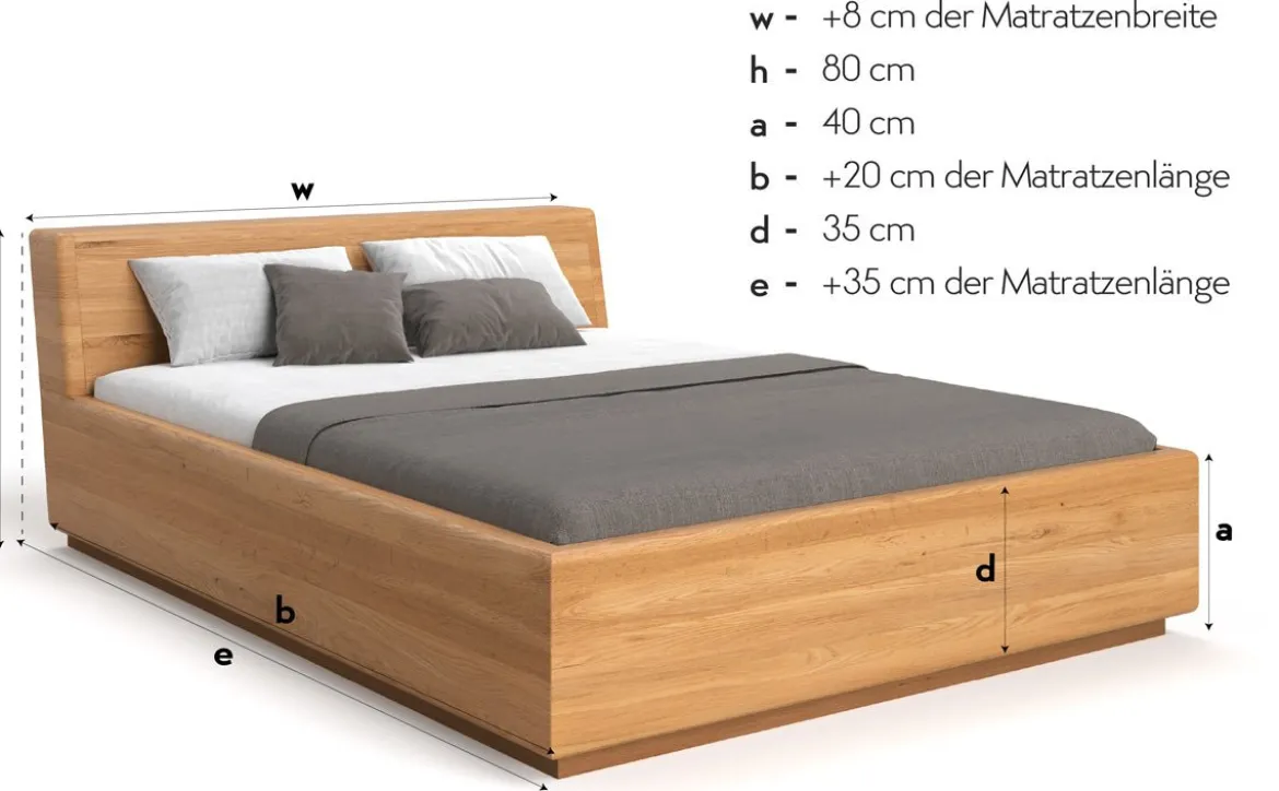 Designer Holzbett Calveno aus massiver Eiche mit Stauraum und geneigtem Headboard
