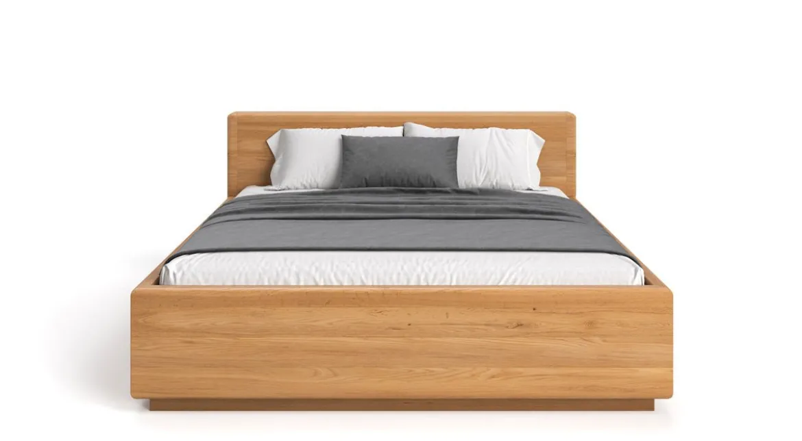 Designer Holzbett Calveno aus massiver Eiche mit Stauraum und geraden Headboard