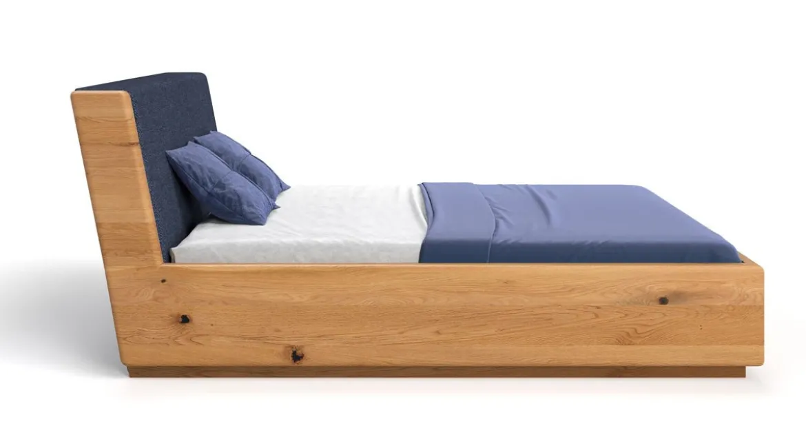 Designer Holzbett Cassian aus massiver Eiche mit Stauraum