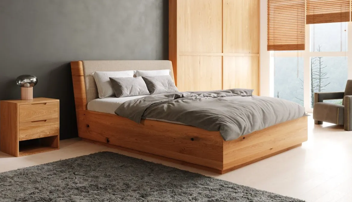 Designer Holzbett Cassian aus massiver Eiche mit Stauraum