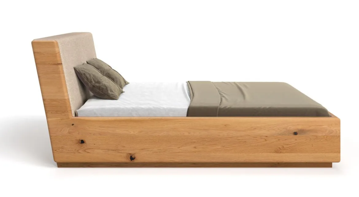 Designer Holzbett Cassian aus massiver Eiche mit Stauraum