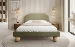 Designer Polsterbett Milo in Bouclé mit runden Holzfüßen