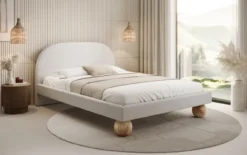 Designer Polsterbett Milo in Bouclé mit runden Holzfüßen