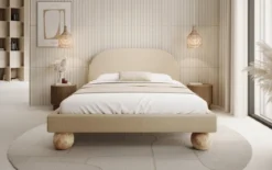 Designer Polsterbett Milo in Bouclé mit runden Holzfüßen