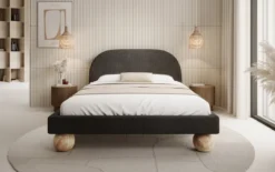 Designer Polsterbett Milo in Bouclé mit runden Holzfüßen