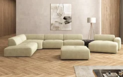 Designer Wohnlandschaft Calm mit Beistellhocker in Bouclé