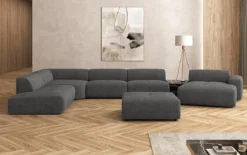 Designer Wohnlandschaft Calm mit Beistellhocker in Bouclé