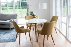 Esstisch Koa - runde Form und stilvolle Farbgebung