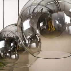 Pendelleuchte „Lumetto“ – Rauchglas mit Farbverlauf und Metallarmatur