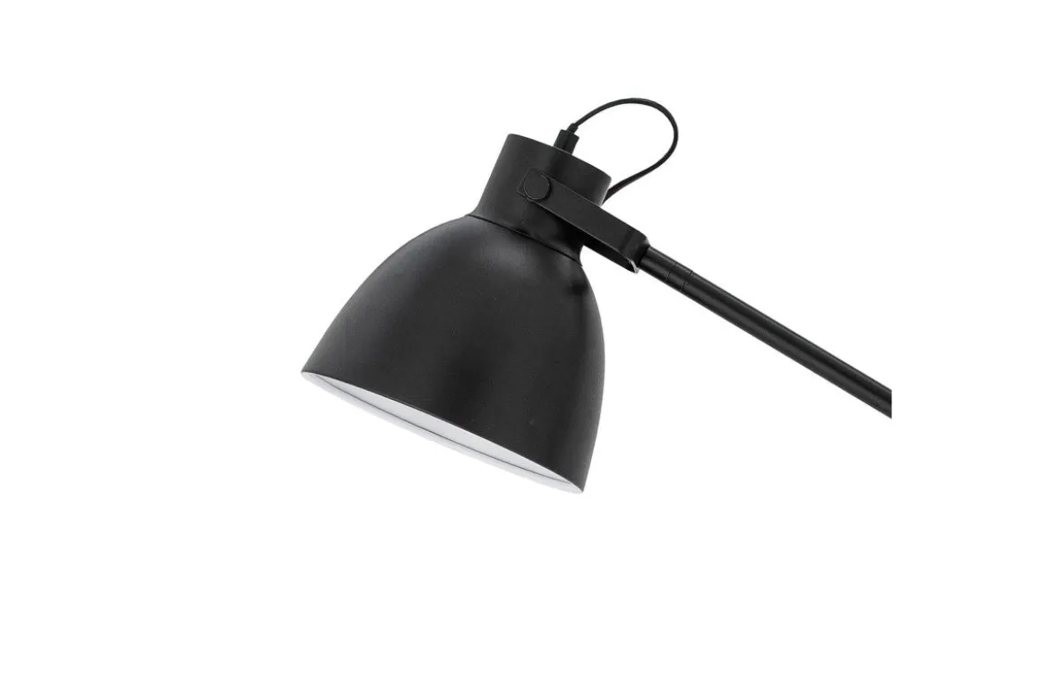 Stehlampe Riven – in der Farbe Schwarz mit Messingdetails