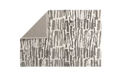 Teppich Inara – in Beige oder Grau aus Polyester & Baumwolle